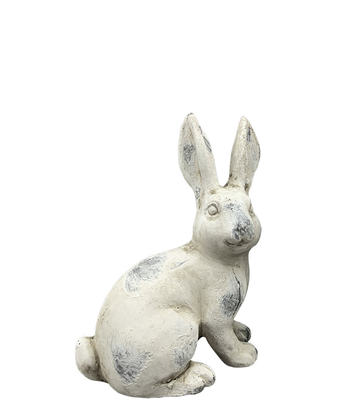 Antikolt felületű, krémszínű húsvéti nyuszi figura.