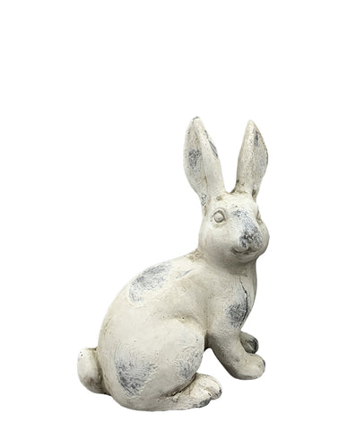 Antikolt felületű, krémszínű húsvéti nyuszi figura.