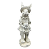 Antikolt felületű, krémszínű húsvéti nyuszilány figura.