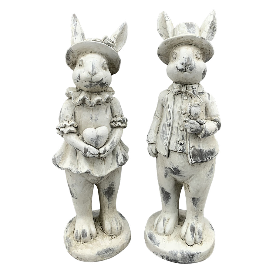 Antikolt felületű, krémszínű húsvéti nyuszilány figura.