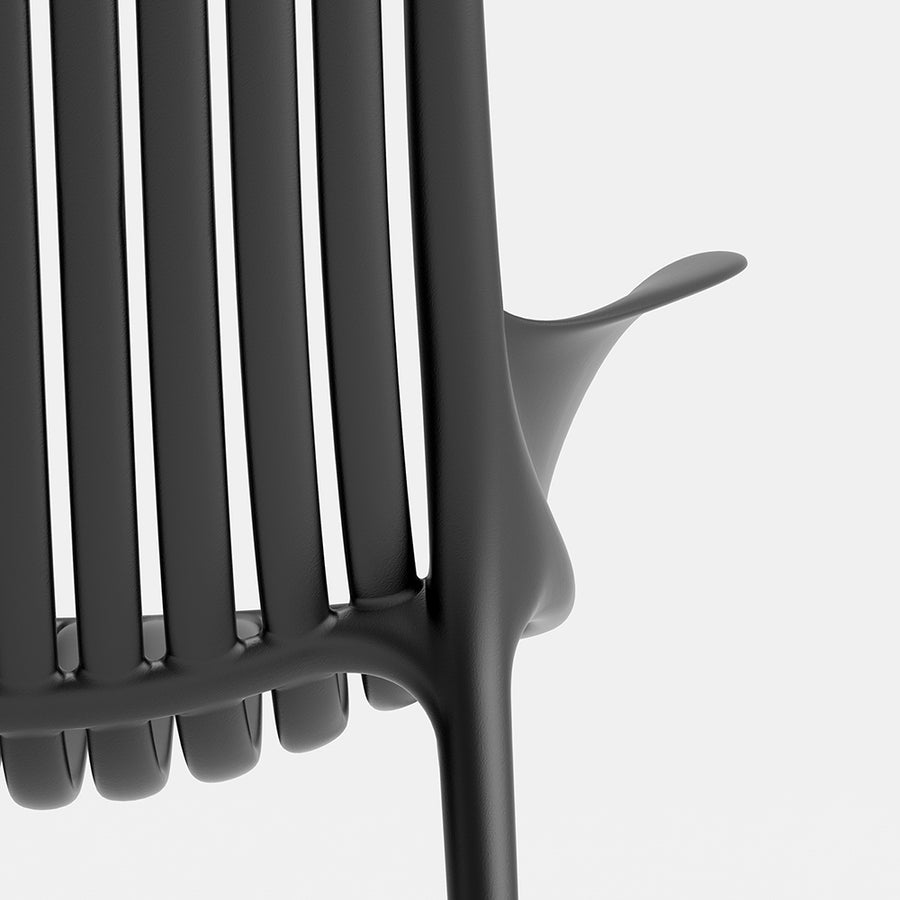 Fekete színű, műanyag design pihenő kerti karosszék.