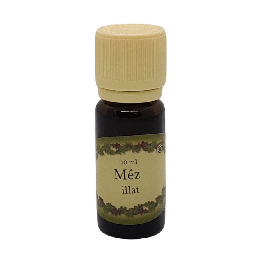 Méz illatú illóolaj 10 ml-es barna üvegcsében, krémszínű kupakkal, édes és megnyugtató aroma otthoni párologtatáshoz.