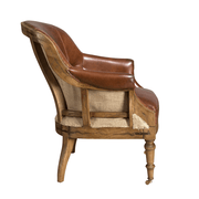 Konyakbarna színű cserzett marhabőrrel kárpitozott desing fotel.