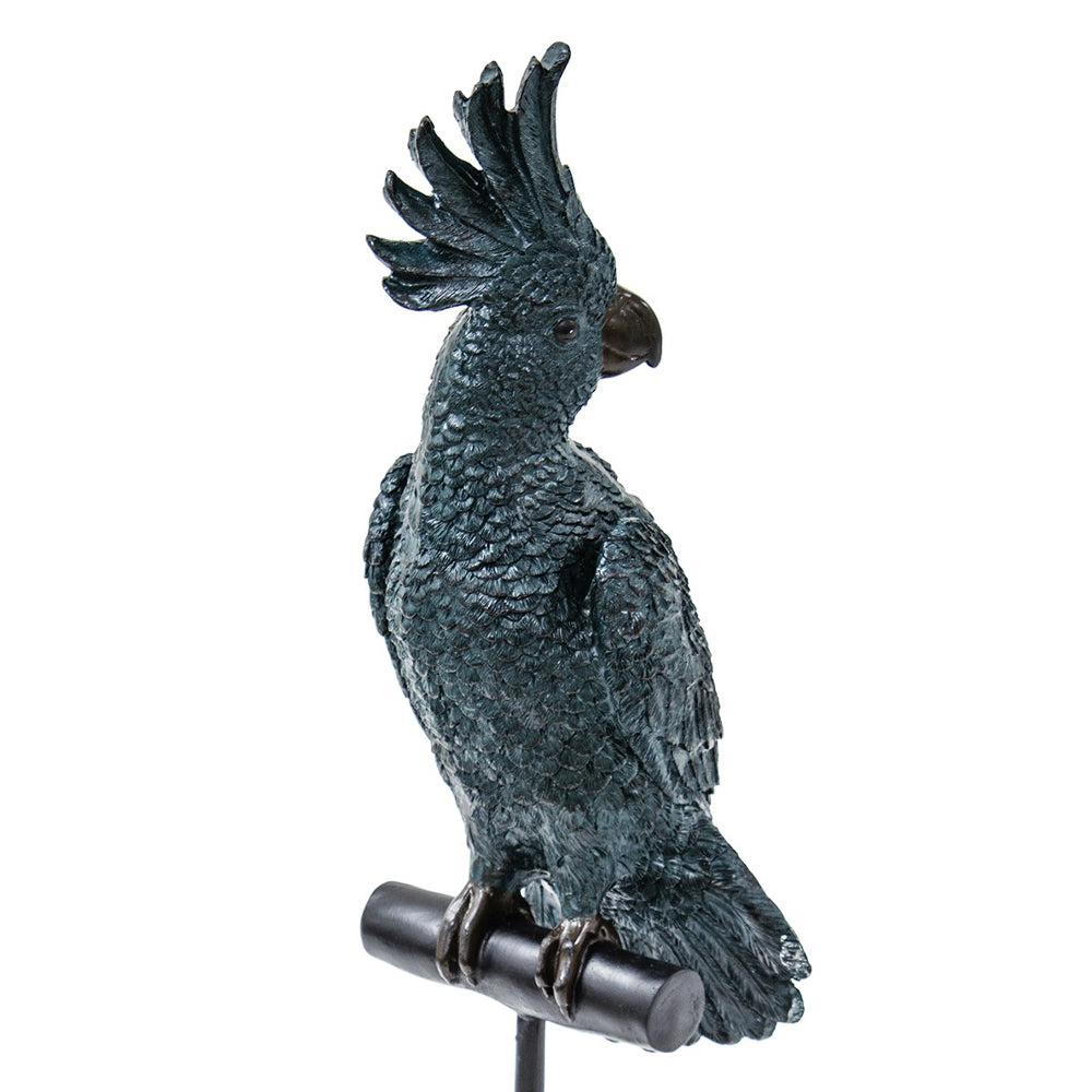 Türkiz színű, dekoratív kakadu figura.