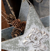 Csillag formájú, bádogból készült karácsonyi dekoráció.