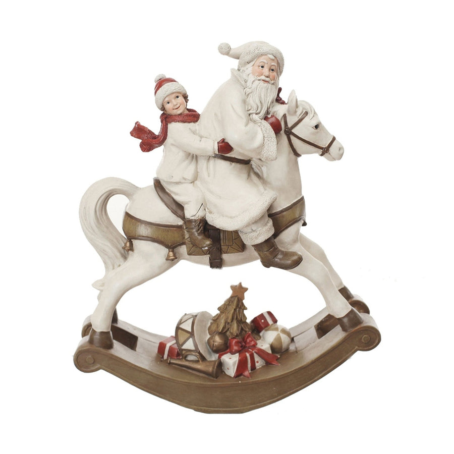 Karácsonyi hintaló Télapóval és kisfiúval.