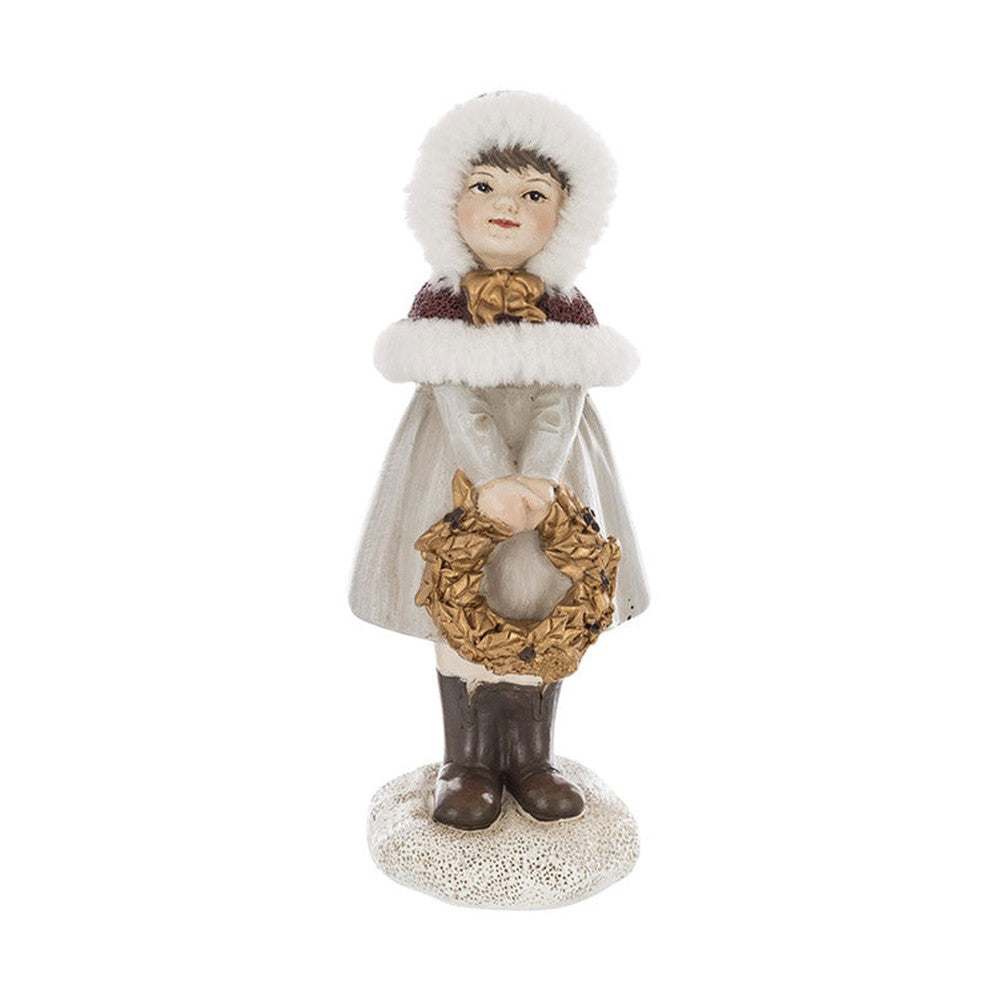 Krémszínű karácsonyi kislány figura.