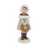 Krémszínű karácsonyi kislány figura.