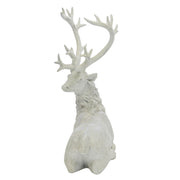 Fehér színű karácsonyi szarvas figura.