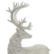 Fehér színű karácsonyi szarvas figura.