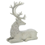 Fehér színű karácsonyi szarvas figura.
