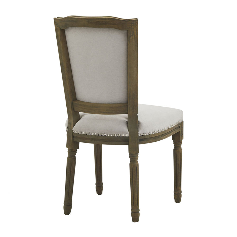 Világosszürke színű szövettel kárpitozott, koloniál stílusú kézműves étkezőszék.