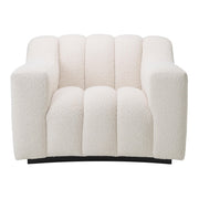 Krémszínű buklé szövettel kárpitozott dizájn fotel .