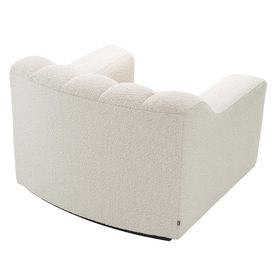 Krémszínű buklé szövettel kárpitozott dizájn fotel .