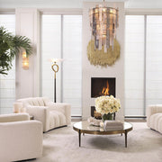 Krémszínű buklé szövettel kárpitozott dizájn fotel .