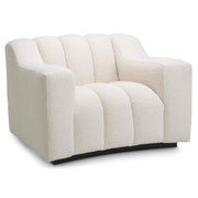 Krémszínű buklé szövettel kárpitozott dizájn fotel .