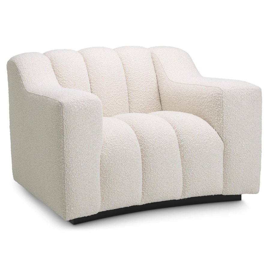 Krémszínű buklé szövettel kárpitozott dizájn fotel .