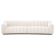 Krémszínű buklé szövettel kárpitozott óriás dizájn kanapé.