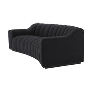 Fekete színű buklé szövettel kárpitozott dizájn kanapé.