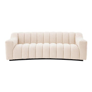 Krémszínű buklé szövettel kárpitozott dizájn kanapé.