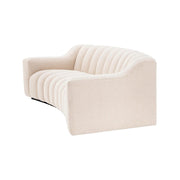 Krémszínű buklé szövettel kárpitozott dizájn kanapé.