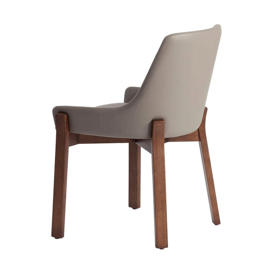 Bézs színű műbőrrel kárpitozott, kőrisfából készült, formatervezett dizájn étkezőszék.