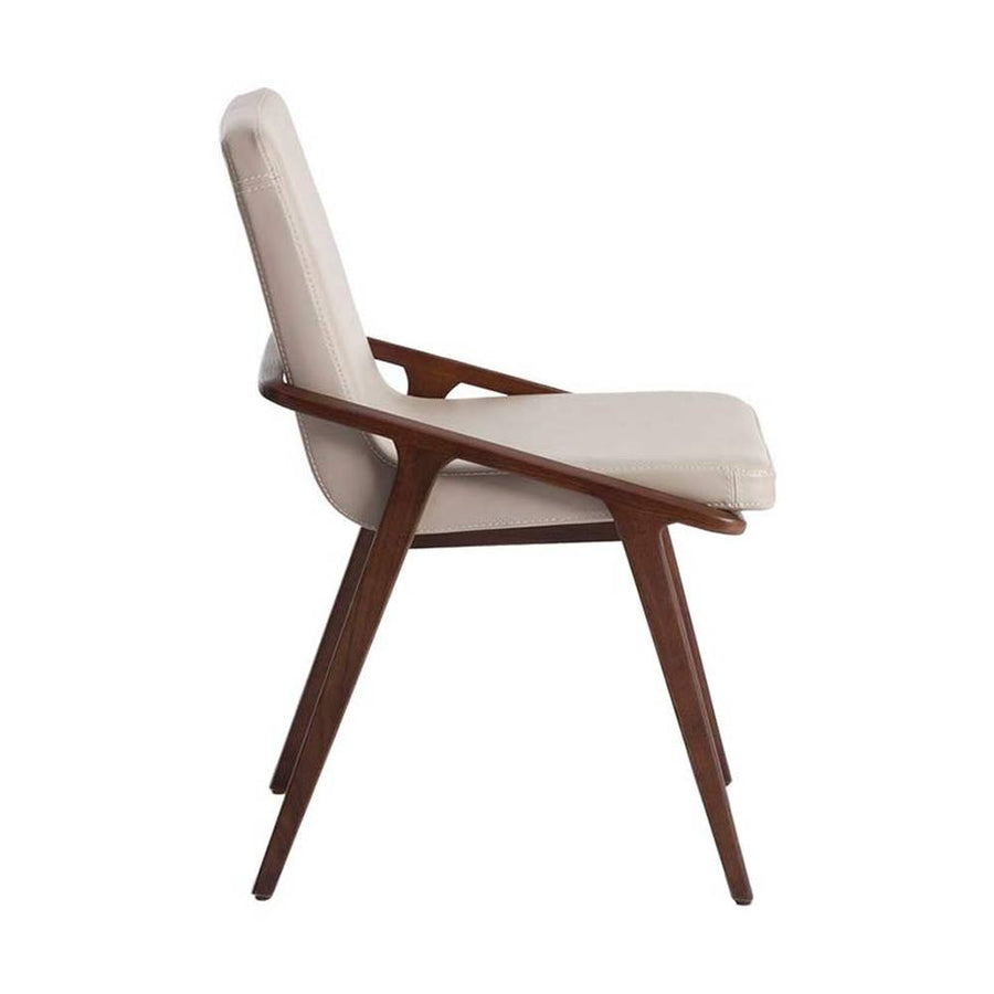 Bézs színű műbőrrel kárpitozott, kőrisfából készült, formatervezett dizájn étkezőszék.