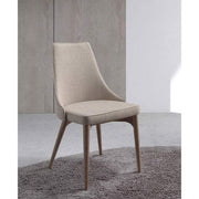 Bézs színű szövettel kárpitozott, kőrisfából készült, formatervezett dizájn étkezőszék.