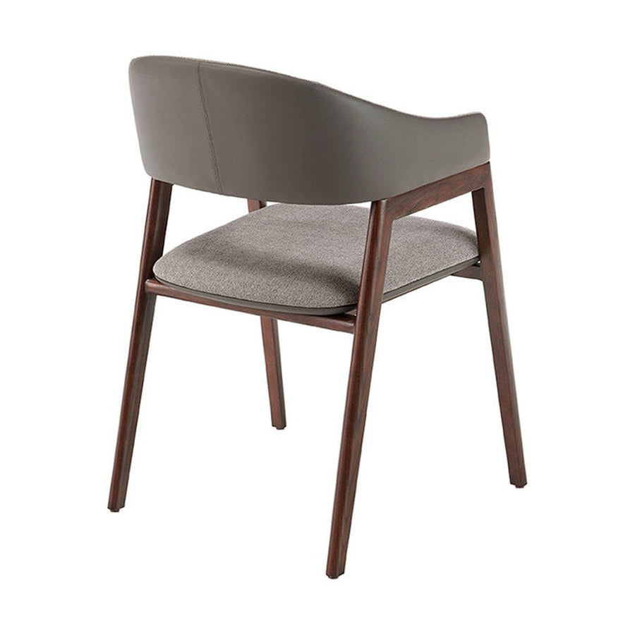 Szürke színű szövettel és műbőrrel kárpitozott, kőrisfából készült, formatervezett dizájn karosszék.