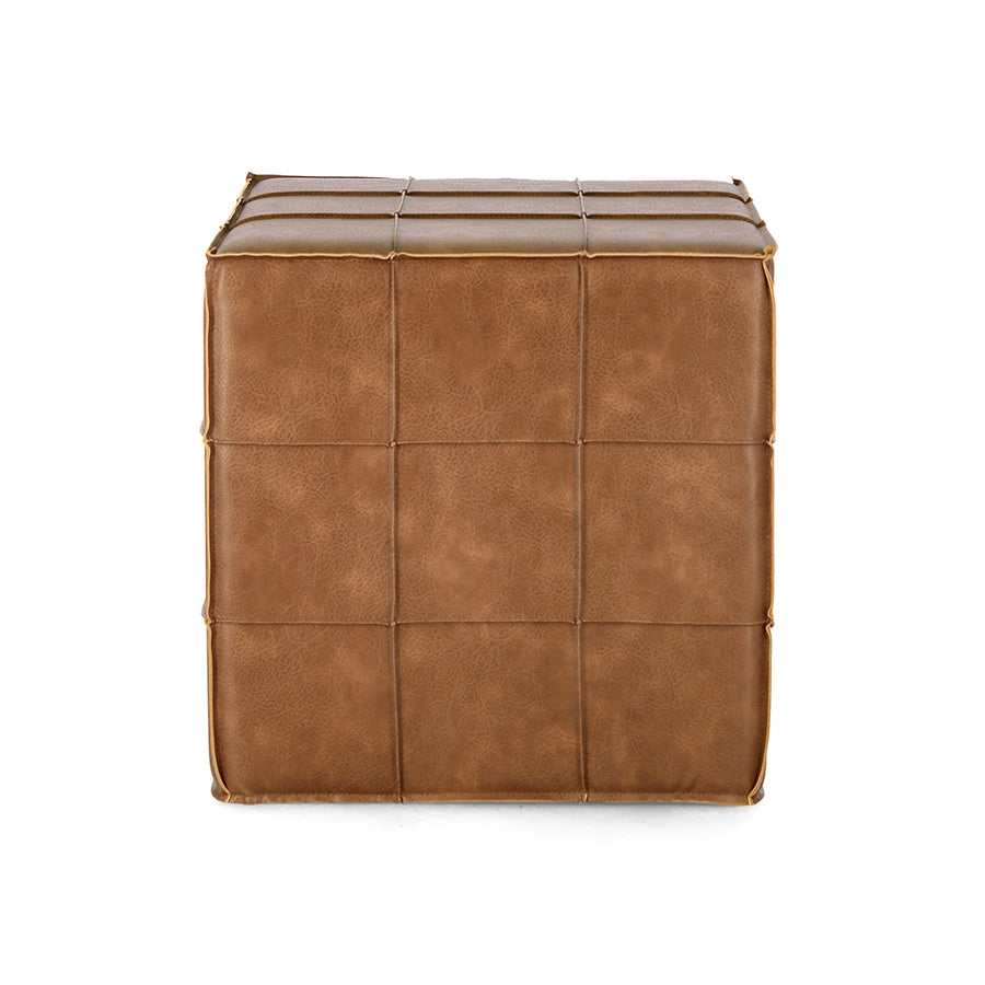Konyakszínű műbőrrel kárpitozott puff.