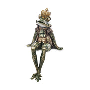 Ülő békakirályfi figura.