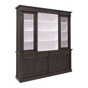 Sötétbarna könyvszekrény fehér belső térrel, három vitrines nyitható ajtóval és négy alsó ajtóval