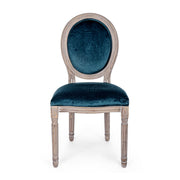 Párizsi kék színű, bársony hatású szövettel kárpitozott étkezőszék.