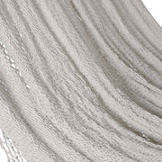 Maya Swing fehér pamut függőágy puha szövött fekvőfelületének közelije.