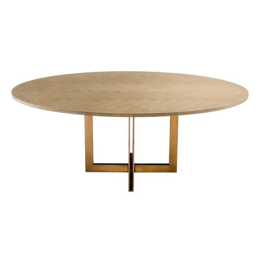 Natúrszínű tölgyfurnérból és sárgaréz felületű rozsdamentes acélból készült, ovális formájú design étkezőasztal.