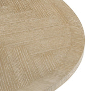 Natúrszínű tölgyfurnérból és sárgaréz felületű rozsdamentes acélból készült, ovális formájú design étkezőasztal.