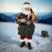 Télapó figura havas tájban.