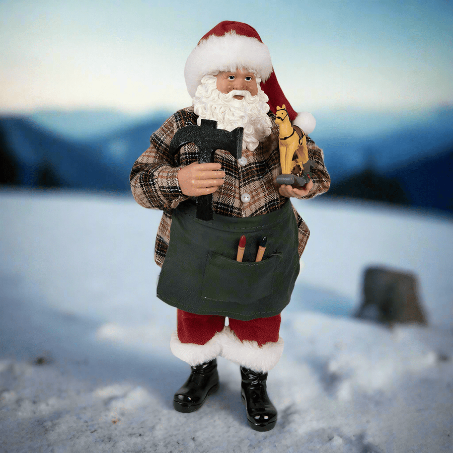 Télapó figura havas tájban.