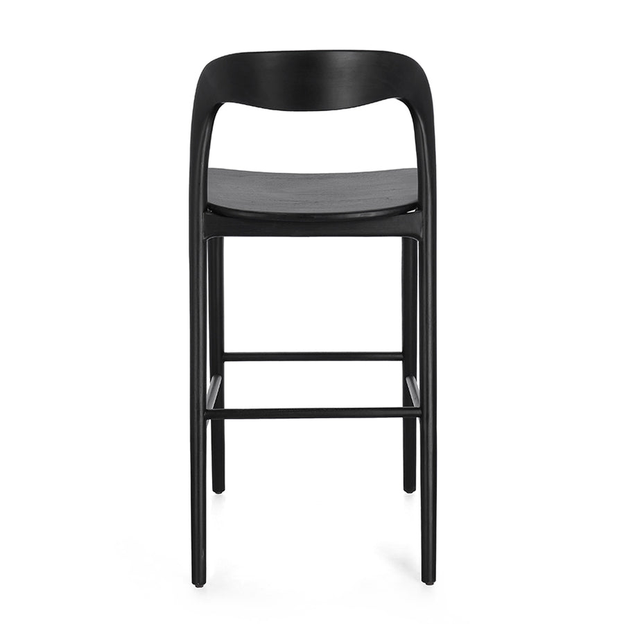 Fekete színű, teakfából ;készült, formatervezett bárszék.