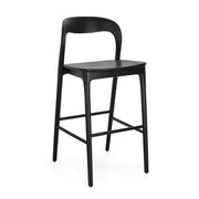 Fekete színű, teakfából ;készült, formatervezett bárszék.