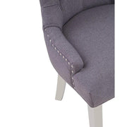 Ezüstszínű, rozsdamentes acéllábbakon álló, szürke színű poliészter vászonnal kárpitozott dizájn étkezőszék.