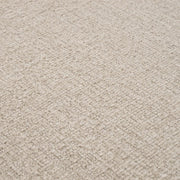 Bézs szövettel kárpitozott, formatervezett design fotel..