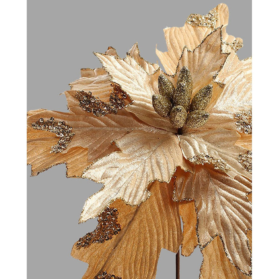 Pezsgőszínű bársonyból készült dekoratív mű mikulásvirág.