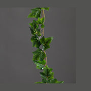 Borostyán girland műnövény.