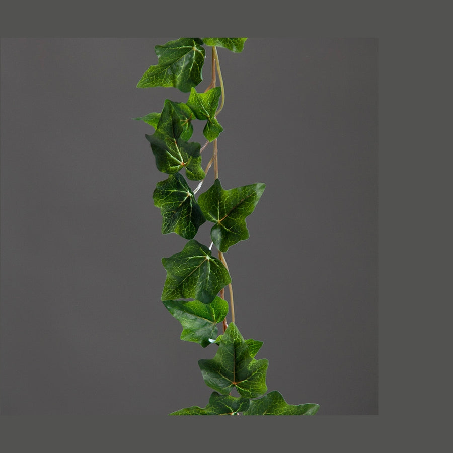 Borostyán girland műnövény.