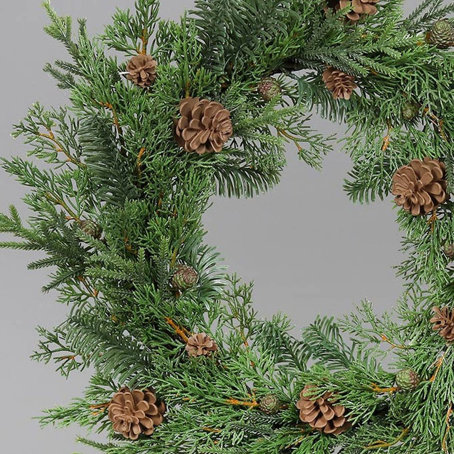 Tobozokkal díszített, mű ciprus fenyő mix koszorú.