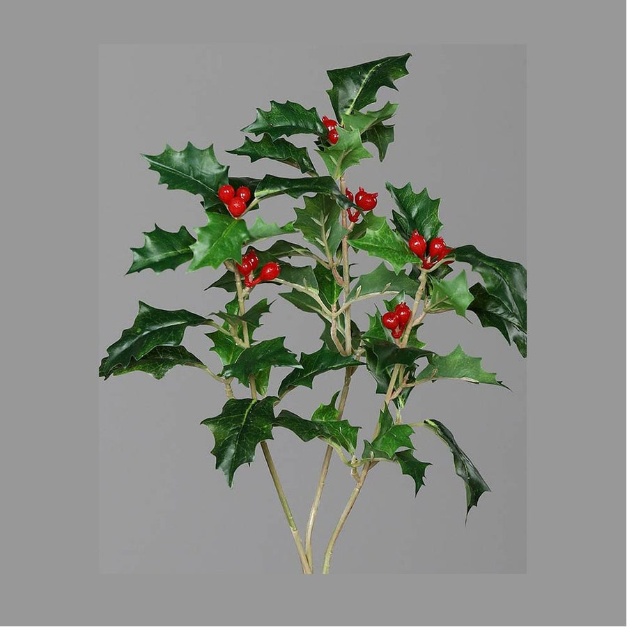 Piros bogyós karácsonyi mű magyal ág.