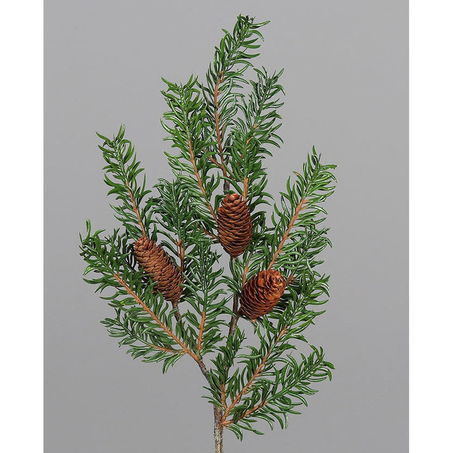 Tobozokkal díszített, zöld színű mű nobilis fenyő ág.