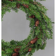 Mesterséges nobilis fenyőágakból készült, tobozokkal díszített ajtódísz koszorú.