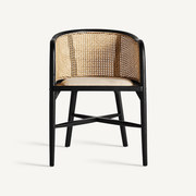 Nuchis fekete nyírfa karosszék szemből, rattan háttámlával és világos ülőpárnával